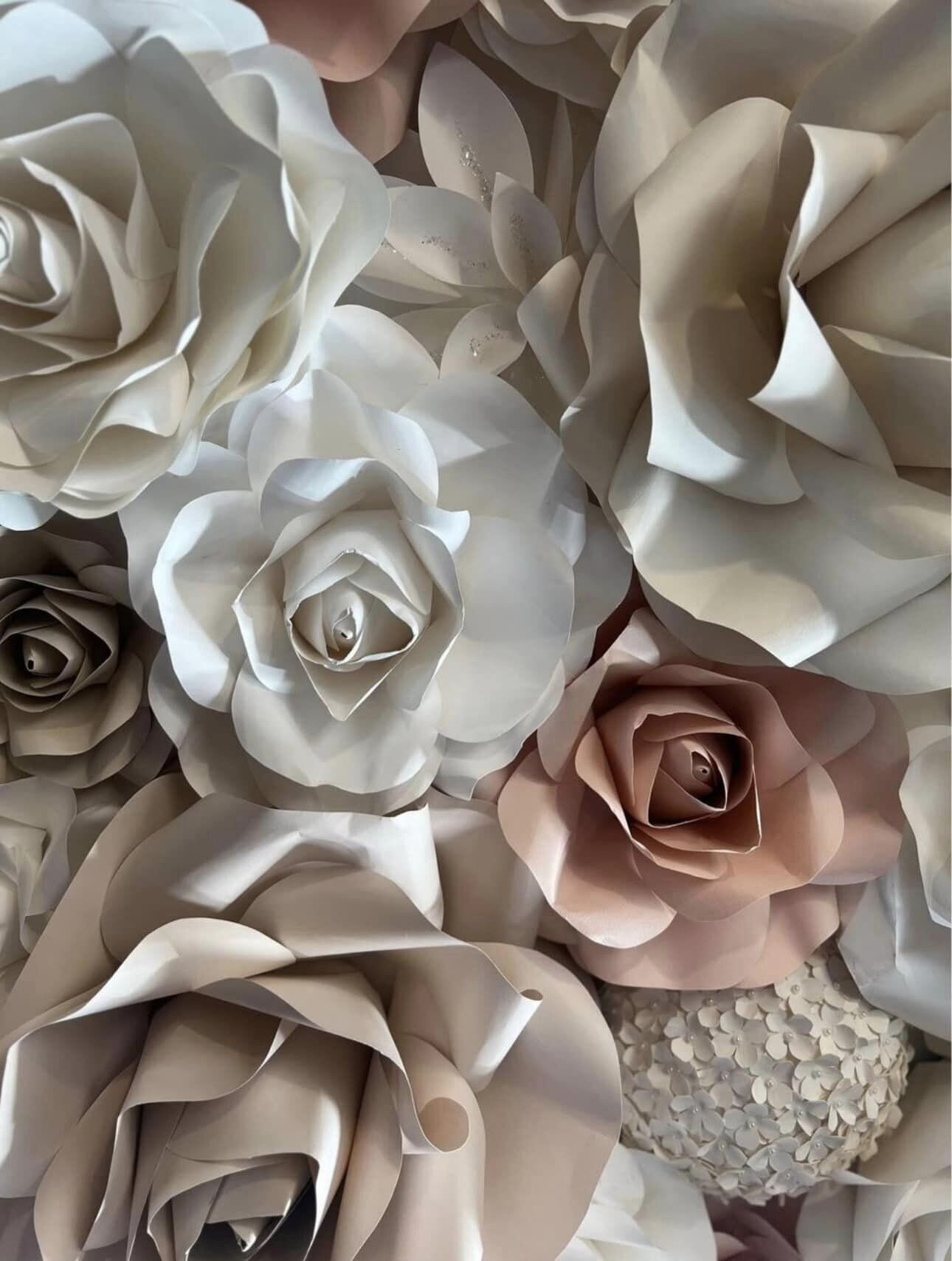 Soft neutral paper flowers from The Bride wall
