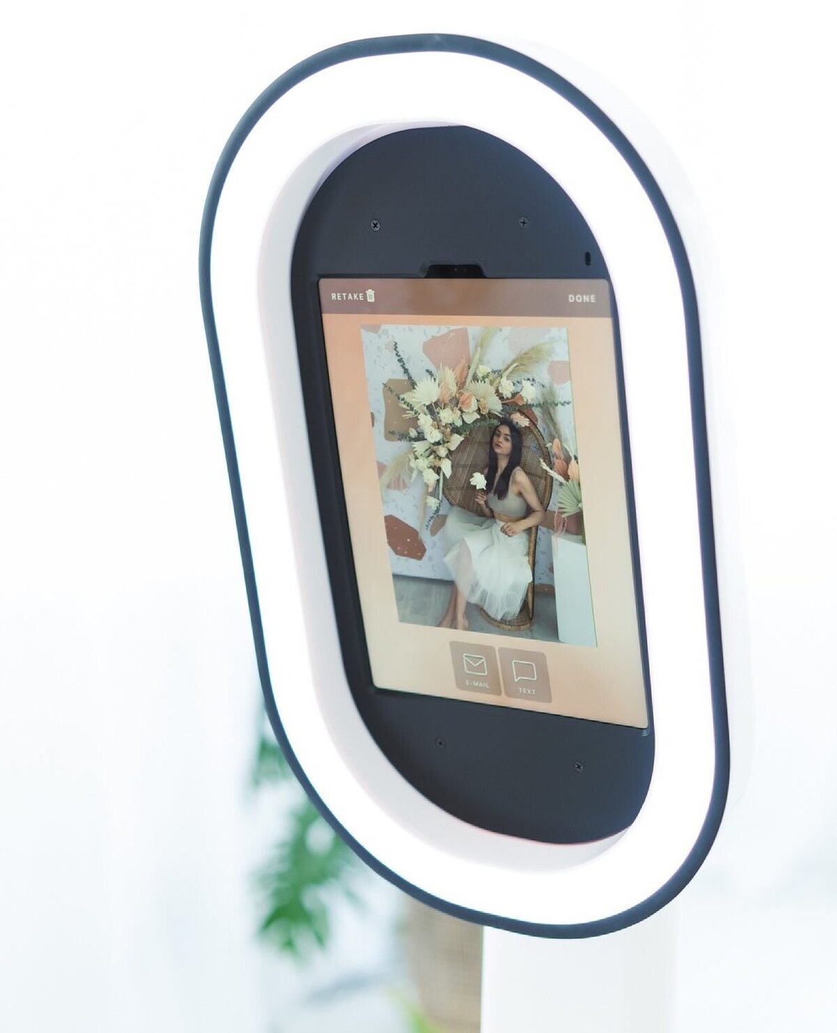 Modern ring light photo booth with touch screen